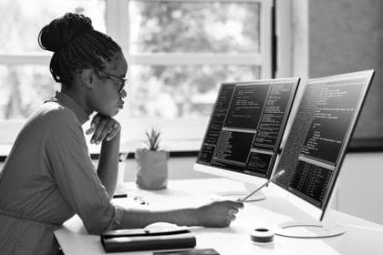 African American Woman Programmer. Girl Coding On Computer