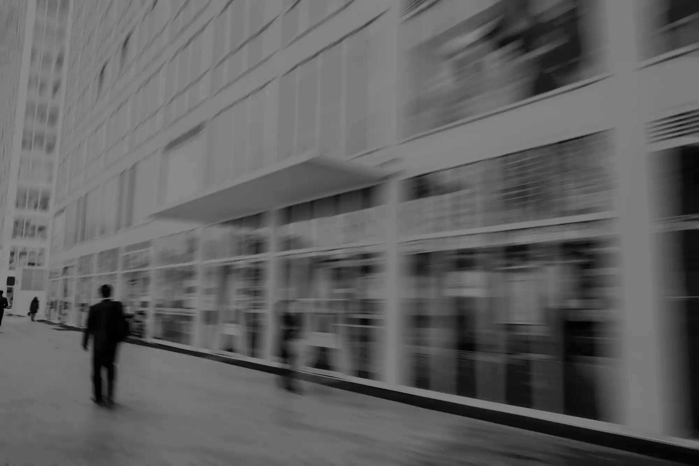 People walking in the business district, motion blur